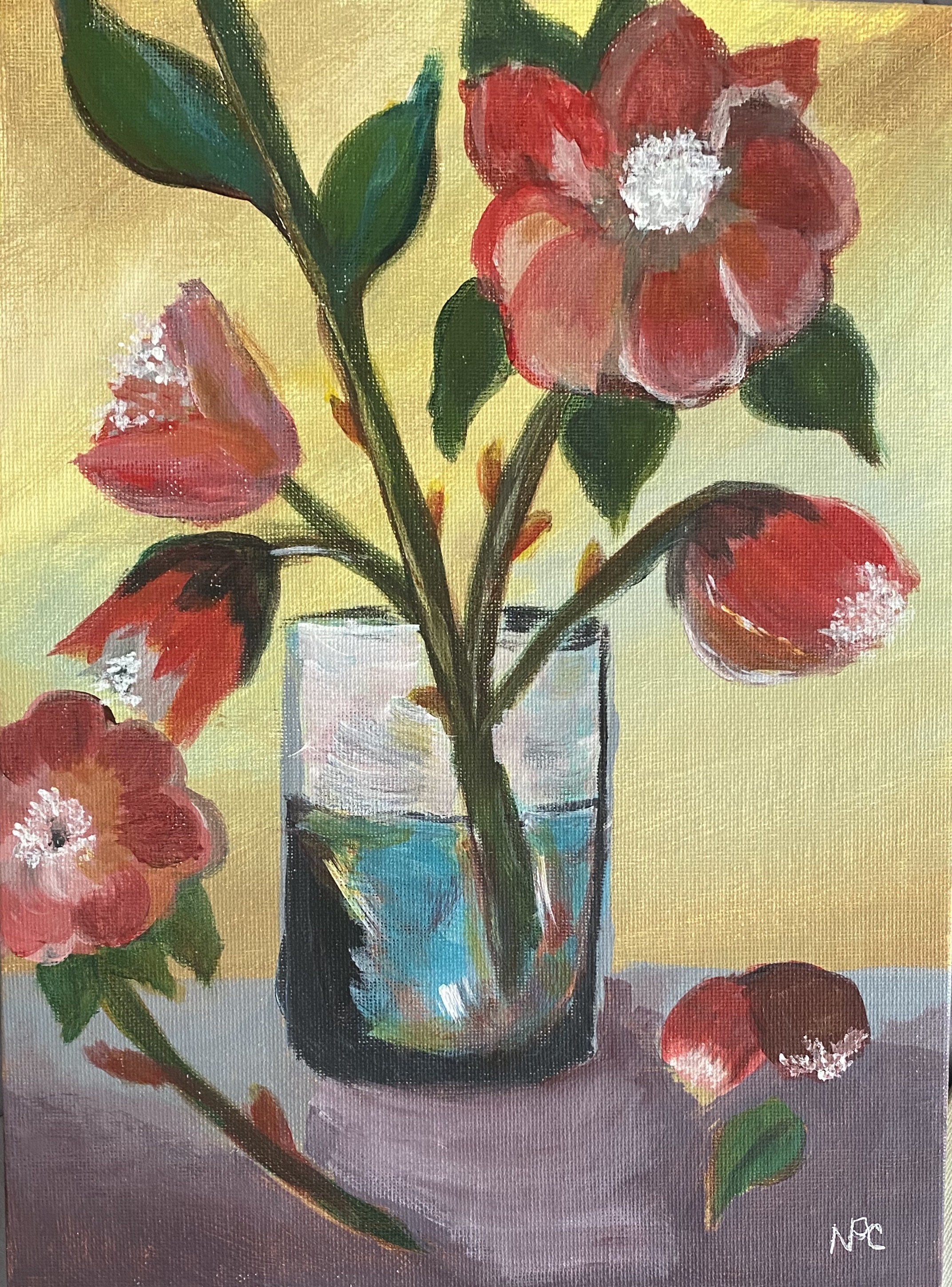 Red flowers in a glass